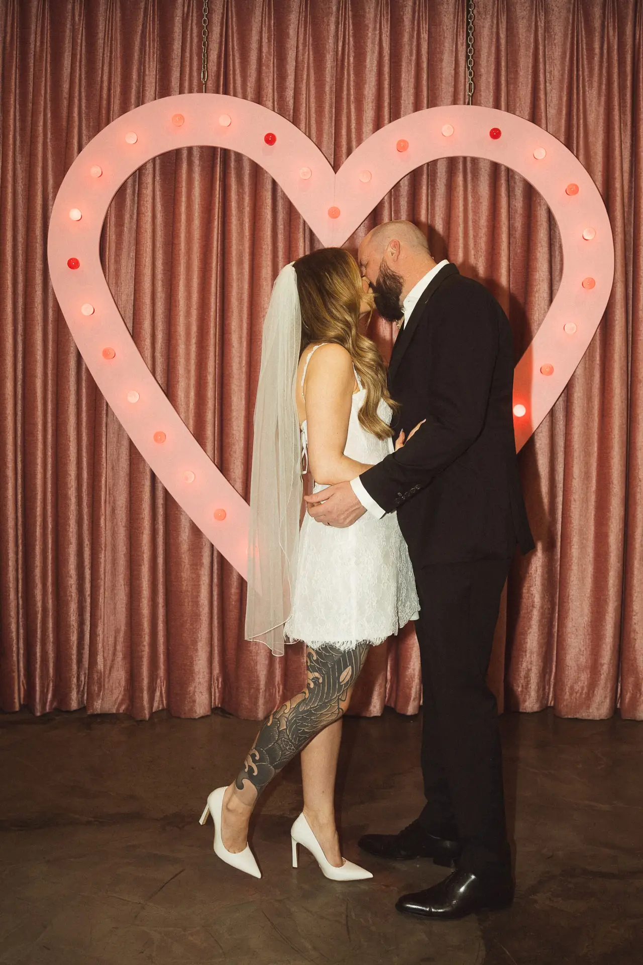 Couple kissing during elopement photography in Las Vegas Wedding Chapel