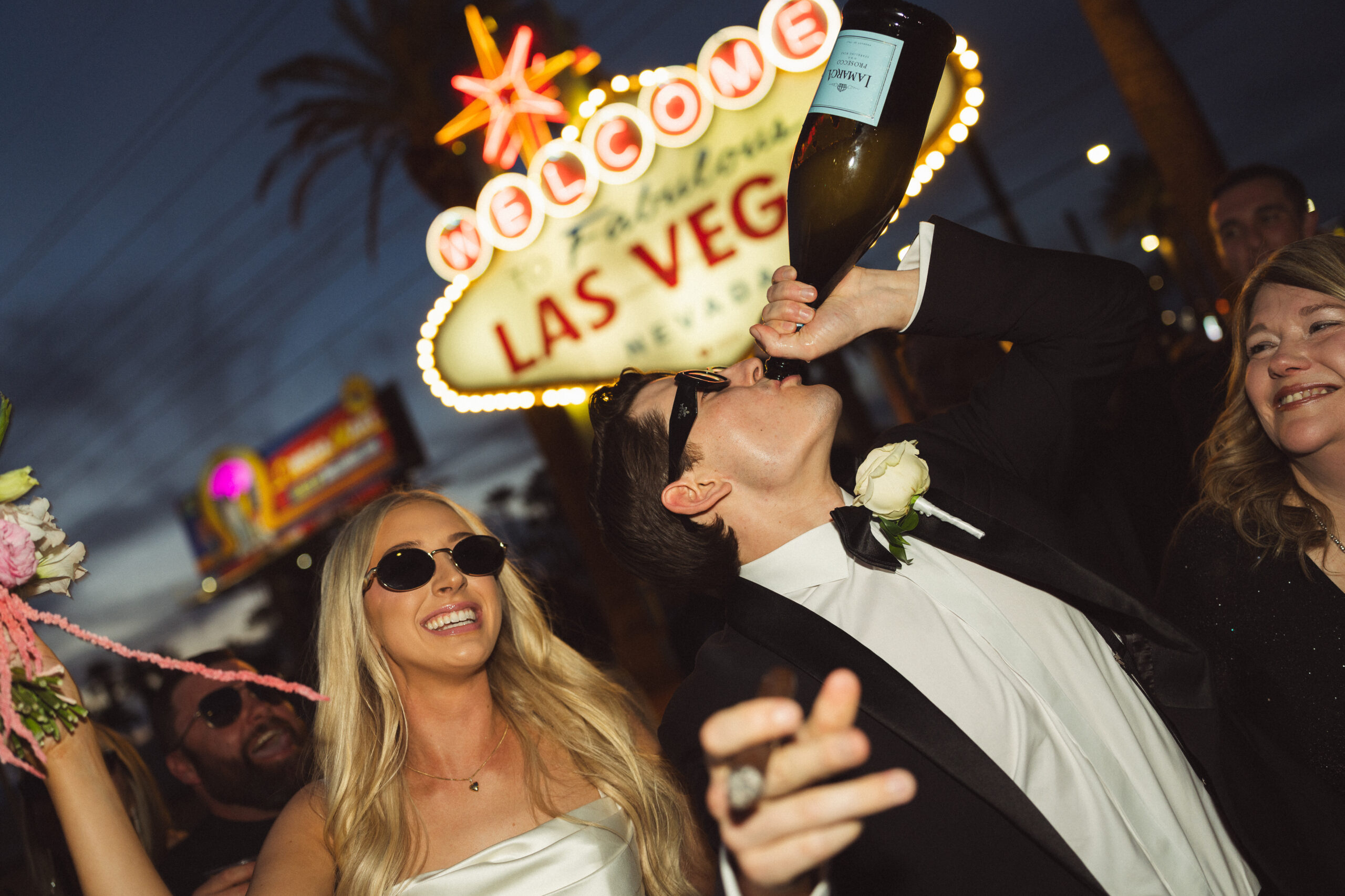 Las Vegas elopement photographer capturing couple portraits at the Las Vegas Sign
