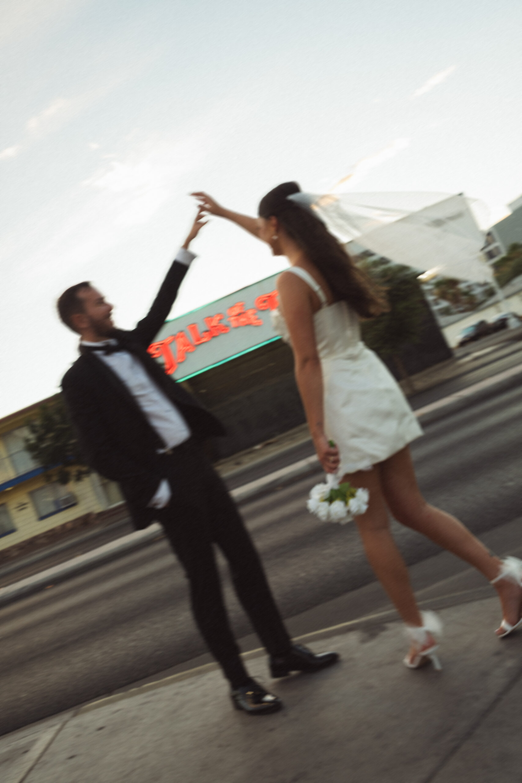 Las Vegas wedding photographer capturing candid couple moments downtown